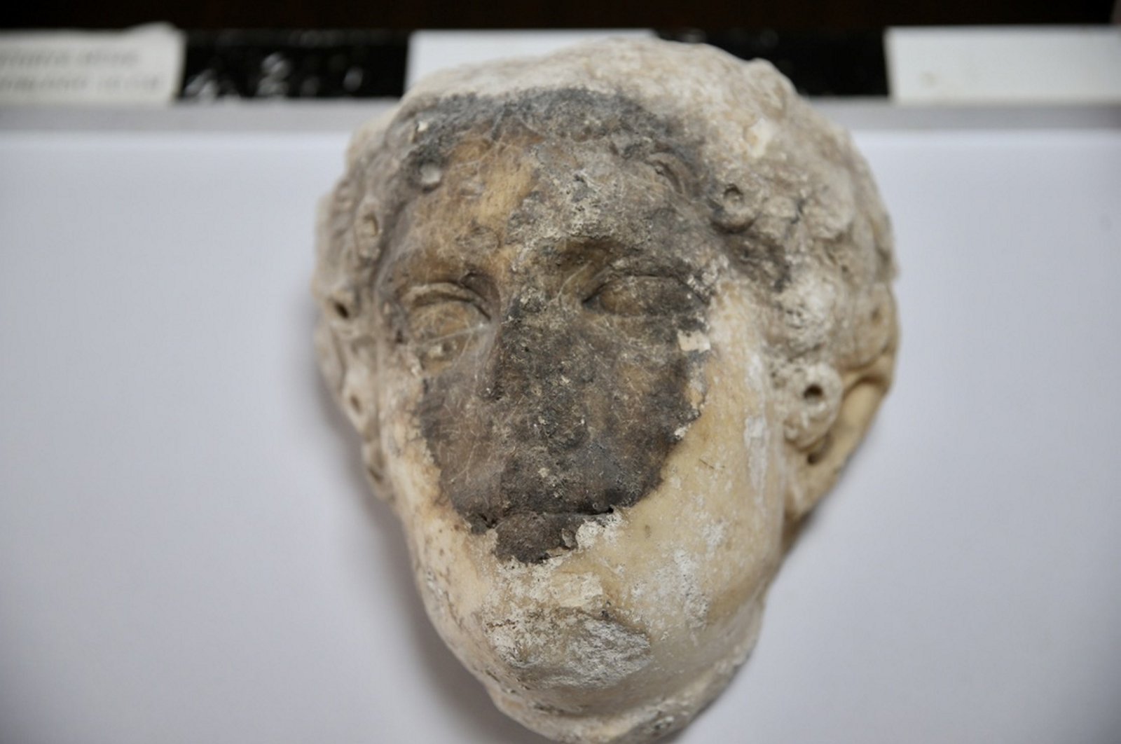 A statue head believed to be of Apollo was discovered during the excavation at Fethiye Castle, Muğla, Türkiye, Aug. 20, 2024. (AA Photo)