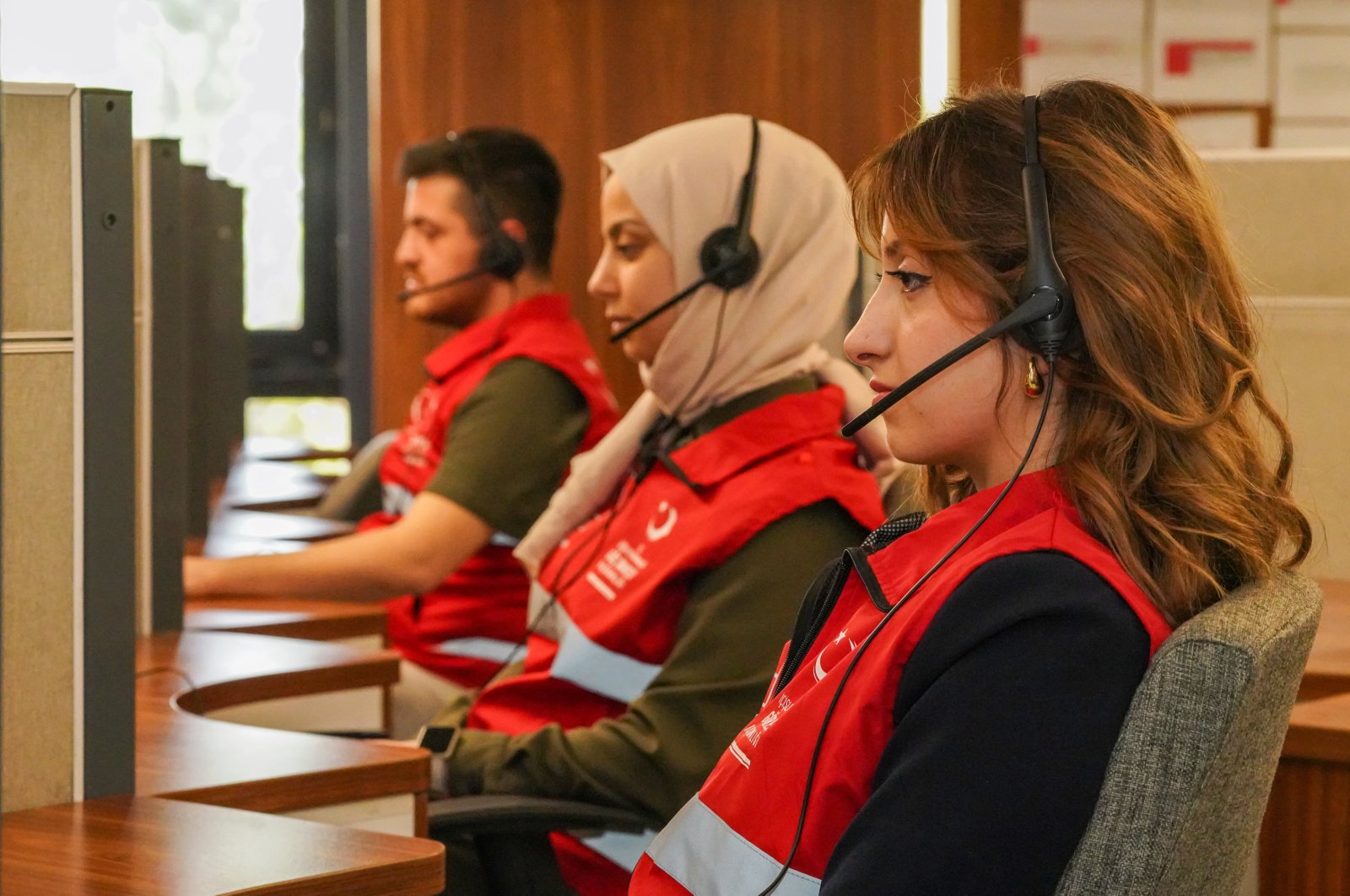 Staff answer calls at the Foreigners Communication Center (YİMER) Call Center, Ankara, Türkiye, May 22, 2024. (AA Photo)