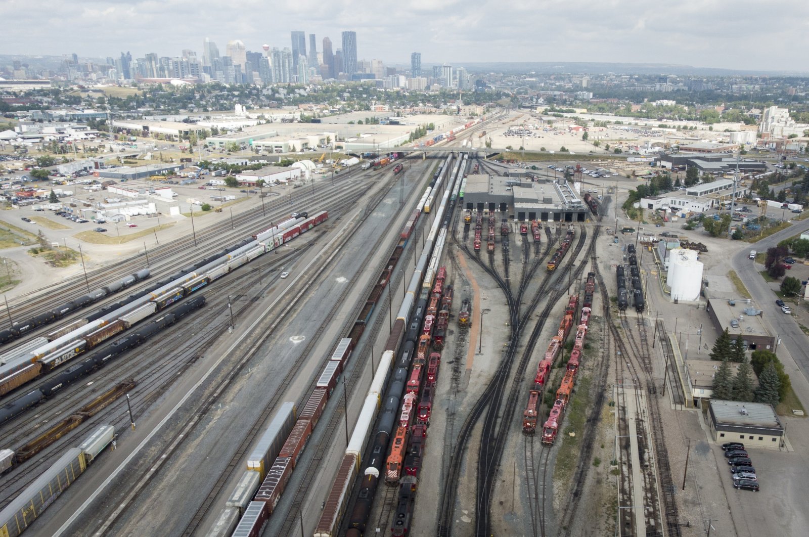 Railcars and locomotives sit idol at the CPKC rail yard in Calgary, Alberta, Canada, Aug. 22, 2024. (The Canadian Press via AP)