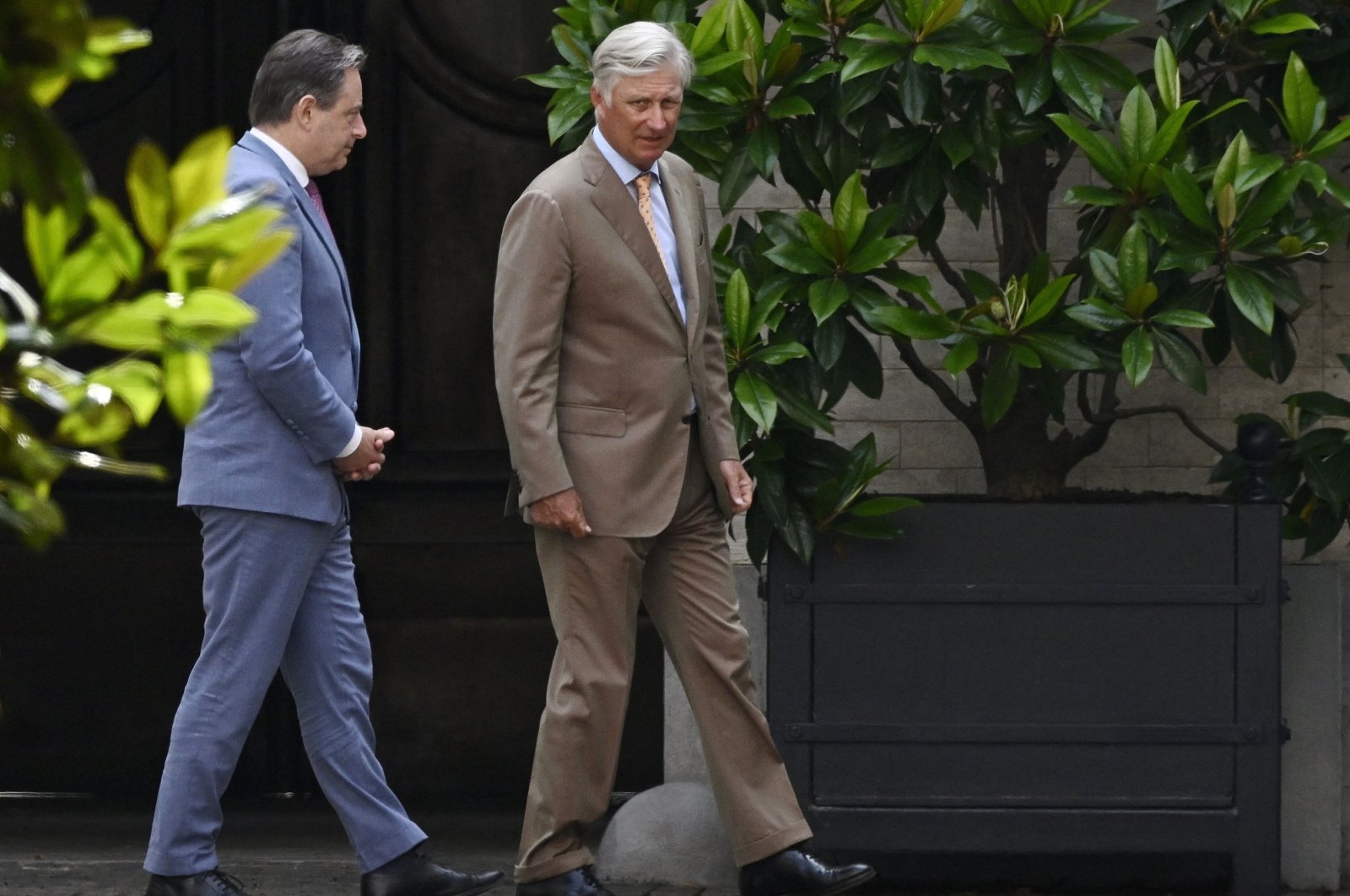 N-VA party chair and informer Bart De Wever walks next to Belgium&#039;s King Philippe during their meeting, in Brussels, Belgium, Aug. 19, 2024. (AFP Photo)