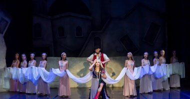 A scene from the ballet &quot;Zorba&quot; on-stage, Bodrum, Türkiye, Aug. 20, 2024. (AA Photo)