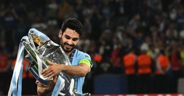 Manchester City&#039;s Ilkay Gündoğan poses with the European Cup trophy as they celebrate winning the UEFA Champions League final football match between Inter Milan and Manchester City at the Atatürk Olympic Stadium, Istanbul, Türkiye, June 10, 2023. (AFP Photo)