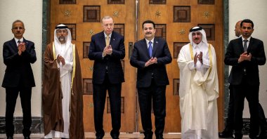 From left, Transport Minister Abdulkadir Uraloğlu, UAE Energy Minister Suhail Mohamed al-Mazrouei, President Recep Tayyip Erdoğan, Iraqi Prime Minister Mohammed S. Al Sudani, Qatari Minister of Transport Jassim bin Saif bin Ahmed al-Sulaiti and Iraq's Transport Minister Razzaq Muhaibas al-Saadawi applaud during their meeting for the signing of the Development Road framework agreement on security, economy and development, Baghdad, Iraq, April 22, 2024. (Reuters Photo)