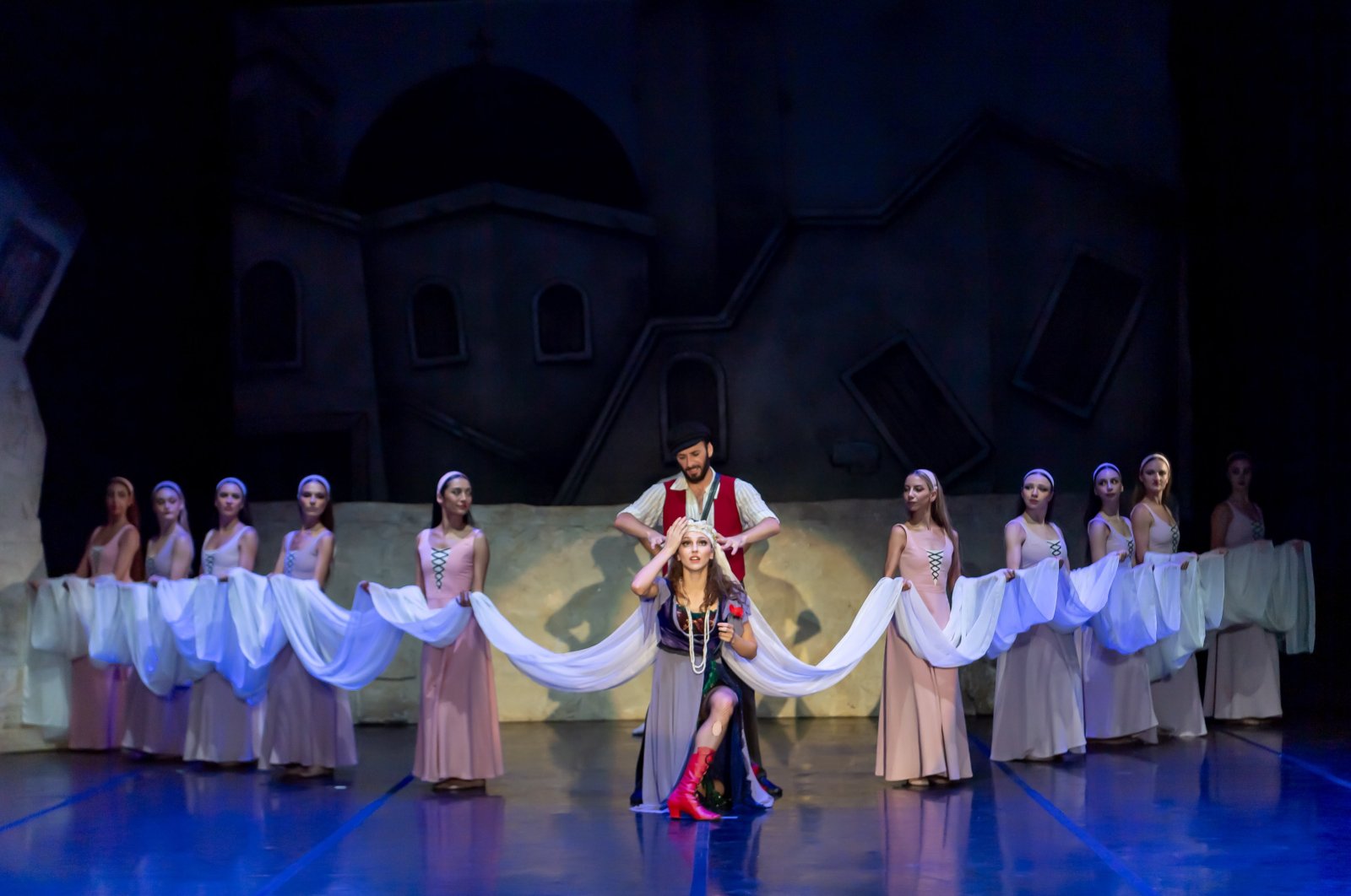 A scene from the ballet &quot;Zorba&quot; on-stage, Bodrum, Türkiye, Aug. 20, 2024. (AA Photo)