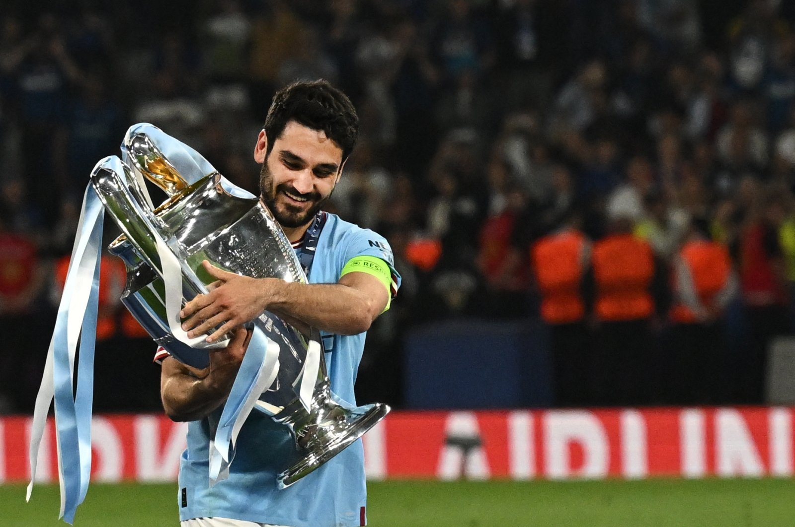 Manchester City&#039;s Ilkay Gündoğan poses with the European Cup trophy as they celebrate winning the UEFA Champions League final football match between Inter Milan and Manchester City at the Atatürk Olympic Stadium, Istanbul, Türkiye, June 10, 2023. (AFP Photo)