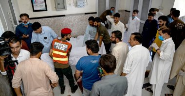 Paramedics and rescue workers carry the bodies of bus accident victims at a hospial in Kahuta, Punjab province, Pakistan, Aug. 25, 2024. (AFP Photo)