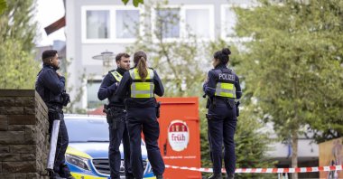 Emergency vehicles and police officers stand at a cordon in the city center of Solingen, Germany, Aug. 25, 2024, near the scene of Friday's deadly attack. (DPA Photo)