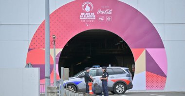 French police stand in position before the arrival of the flame of the Paris 2024 Paralympic Games at the Channel Tunnel in France, after it was lit in Stoke Mandeville of England, Aug. 25, 2024. (AFP Photo)