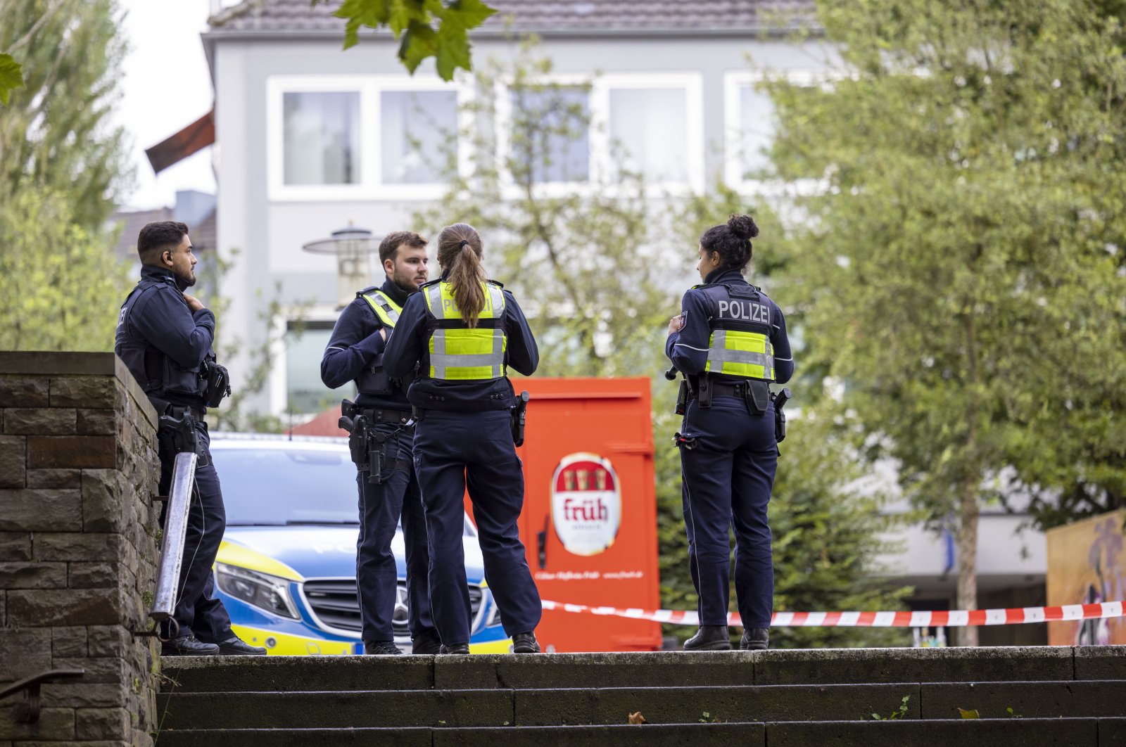 Emergency vehicles and police officers stand at a cordon in the city center of Solingen, Germany, Aug. 25, 2024, near the scene of Friday&#039;s deadly attack. (DPA Photo)