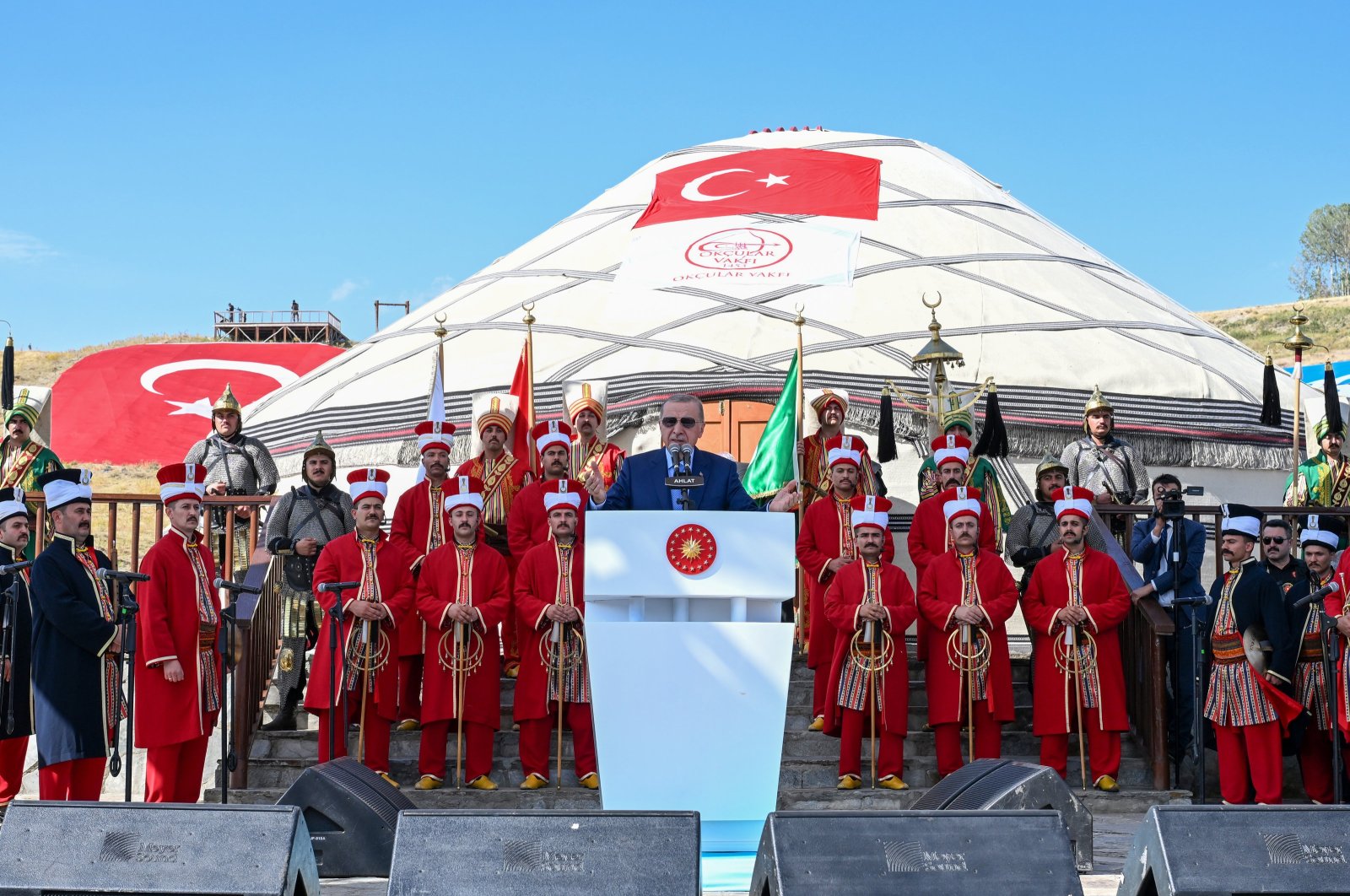 President Recep Tayyip Erdoğan speaks against the backdrop of Mehter, an Ottoman military band, in Bitlis, southeastern Türkiye, Aug. 25, 2024. (AA Photo)