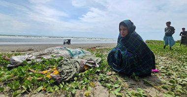 Relatives mourn near the bodies of deceased Rohingya refugees who drowned in the Naf River, Teknaf, Cox's Bazar, Bangladesh, Aug. 6, 2024. (AFP Photo)