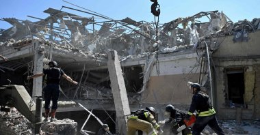 Ukrainian emergency services carry out a search and rescue operation among the rubble of a destroyed hotel after a strike in Kramatorsk, Ukraine, Aug. 25, 2024. (AFP Photo)