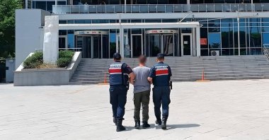 Police escort to the courthouse a convicted FETÖ fugitive in the southern Mersin province, Türkiye, Aug. 14, 2024. (IHA Photo)