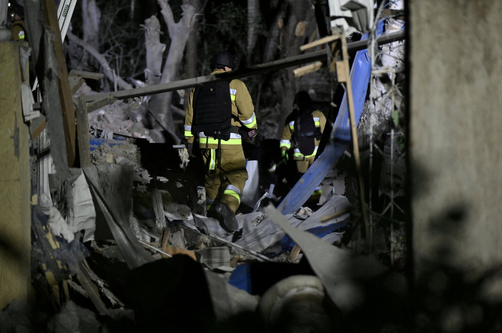 Ukrainian emergency services conduct a search and rescue operation among the rubble at the site where a hotel was hit by a missile in Kramatorsk, Donetsk, Ukraine, Aug. 24, 2024. (Reuters Photo) 