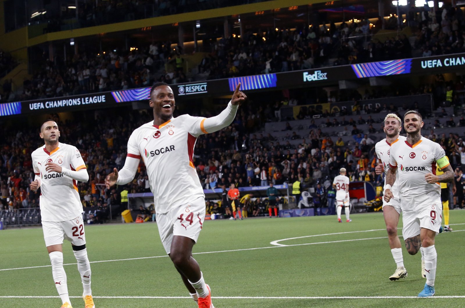 Galatasaray players celebrate during the UEFA Champions League play-off first leg match against the Young Boys, Bern, Switzerland, Aug. 21, 2024. (Getty Image Photo)