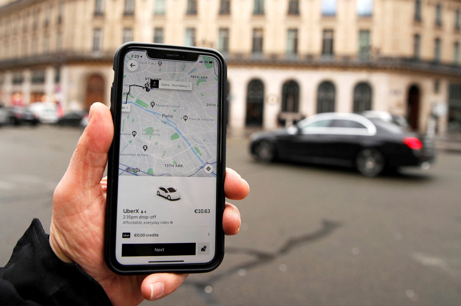 A photo Illustration shows the Uber application on a mobile phone in central Paris, France, March 5, 2020. (Reuters Photo)