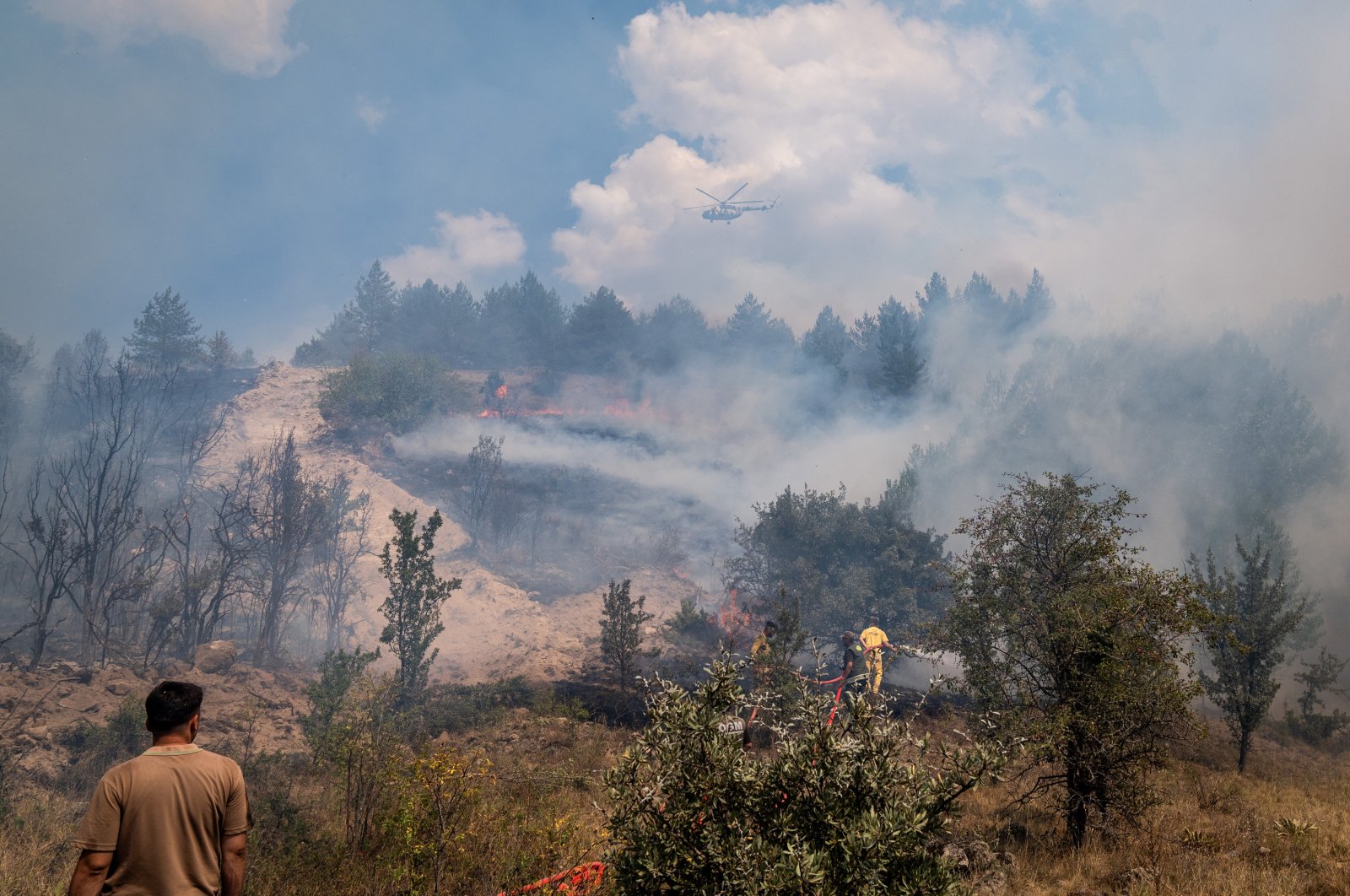 Teams work to control the fire from both ground and air in Kızılcahamam district, Ankara, Türkiye, Aug. 22, 2024. (AA Photo)