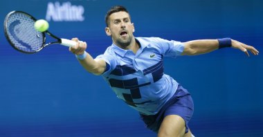 Serbia's Novak Djokovic serves to Moldova's Radu Albot during their first-round match at the U.S. Open Tennis Championships at the USTA Billie Jean King National Tennis Center in Flushing Meadows, New York, U.S., Aug. 26, 2024. (EPA Photo)