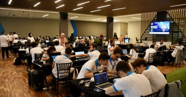 Participants are photographed during a competition organized within the grounds of Bilişim Vadisi, Kocaeli, northwestern Türkiye, Aug. 8, 2024. (AA Photo)