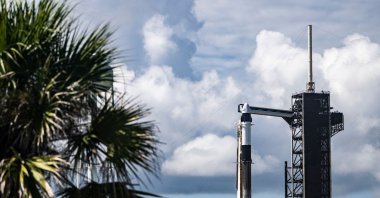 A SpaceX Falcon 9 rocket with the Crew Dragon Resilience capsule sits on Launch Complex 39A at Kennedy Space Center ahead of the Polaris Dawn Mission due to launch on Aug. 27 at the Kennedy Space Center in Florida, U.S., Aug. 26, 2024. (AFP Photo)
