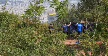 Authorities conducted an investigation at the crime scene in Bornova, Izmir, western Türkiye, Aug. 27, 2024. (AA Photo)