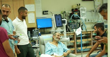 A handout photo made available by Israel&#039;s Government Press Office (GPO) shows a meeting between Farhan Qadi (C), who was rescued from being held hostage by Hamas in Gaza, and members of his family at Soroka Medical Center in Be&#039;er Sheva, Israel,  Aug. 27, 2024. (EPA Photo)