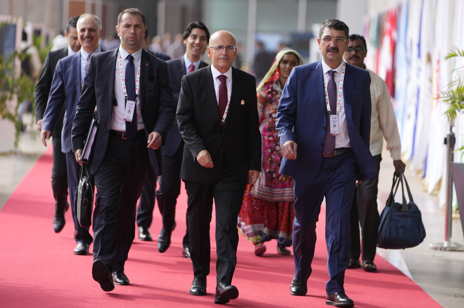 Treasury and Finance Minister Mehmet Şimşek (C) arrives to attend G-20&#039;s third Finance Ministers and Central Bank Governors meeting in Gandhinagar, India, July 18, 2023. (AP Photo)