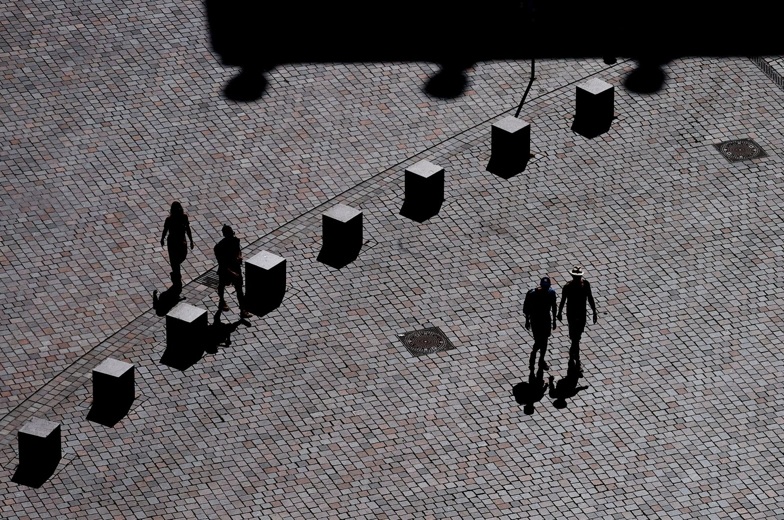 Pedestrians walk at the Old Market Square in Potsdam, Brandenburg, Germany, Aug. 12, 2024. (EPA Photo)