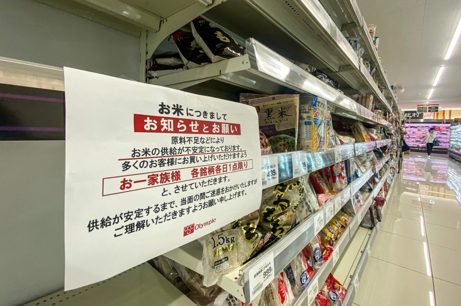 Empty shelves of rice are pictured in a supermarket with a notice written: &quot;Due to shortage of resource materials, the supply of rice has been unstable. So for many customers to be able to buy, we ask you to buy one brand a day for a family. We beg you for your understanding for causing troubles until the supply stabilizes,&quot; in the Koto district of Tokyo, Japan, Aug. 27, 2024. (AFP Photo)