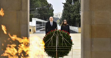 Azerbaijani President Ilham Aliyev and Azerbaijan&#039;s First Lady and Vice President Mehriban Aliyeva attend a laying ceremony at the Honorary Alley and the Alley of Martyrs in Baku, Azerbaijan, Dec. 4, 2020. (AP Photo)
