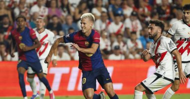 Barcelona's Dani Olmo (L) in action against Rayo Vallecano's Unai Lopez (R) during the La Liga match, at the Vallecas Stadium, Madrid, Spain, Aug. 27, 2024. (EPA Photo)