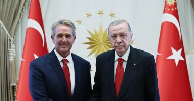 U.S. Ambassador in Ankara Jeff Flake (L) shakes hands with President Recep Tayyip Erdoğan, Ankara, Türkiye, Aug. 28, 2024. (AA Photo)