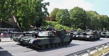 Polish soldiers ride on military vehicles as they take part in the military parade during the Polish Armed Forces Day, Warsaw, Poland, Aug. 15, 2024. (EPA Photo)