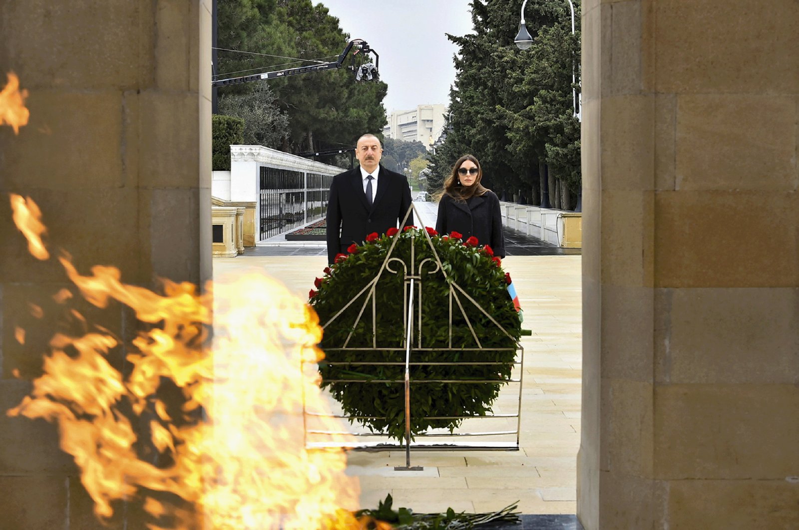 Azerbaijani President Ilham Aliyev and Azerbaijan&#039;s First Lady and Vice President Mehriban Aliyeva attend a laying ceremony at the Honorary Alley and the Alley of Martyrs in Baku, Azerbaijan, Dec. 4, 2020. (AP Photo)