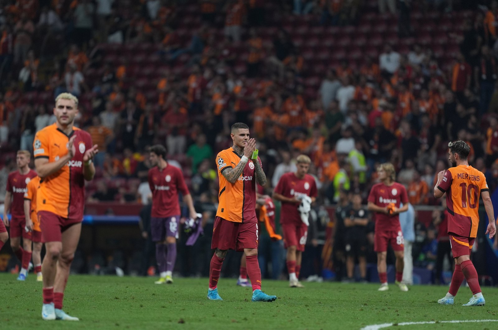 Galatasaray players applaud fans following the UEFA Champions League playoff match against Young Boys at the RAMS Park, Istanbul, Türkiye, Aug. 28, 2024. (AA Photo)