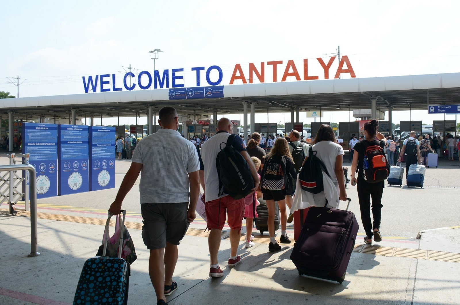 Tourists are photographed at Antalya Airport, Antalya, southern Türkiye, July 31, 2024. (IHA Photo)