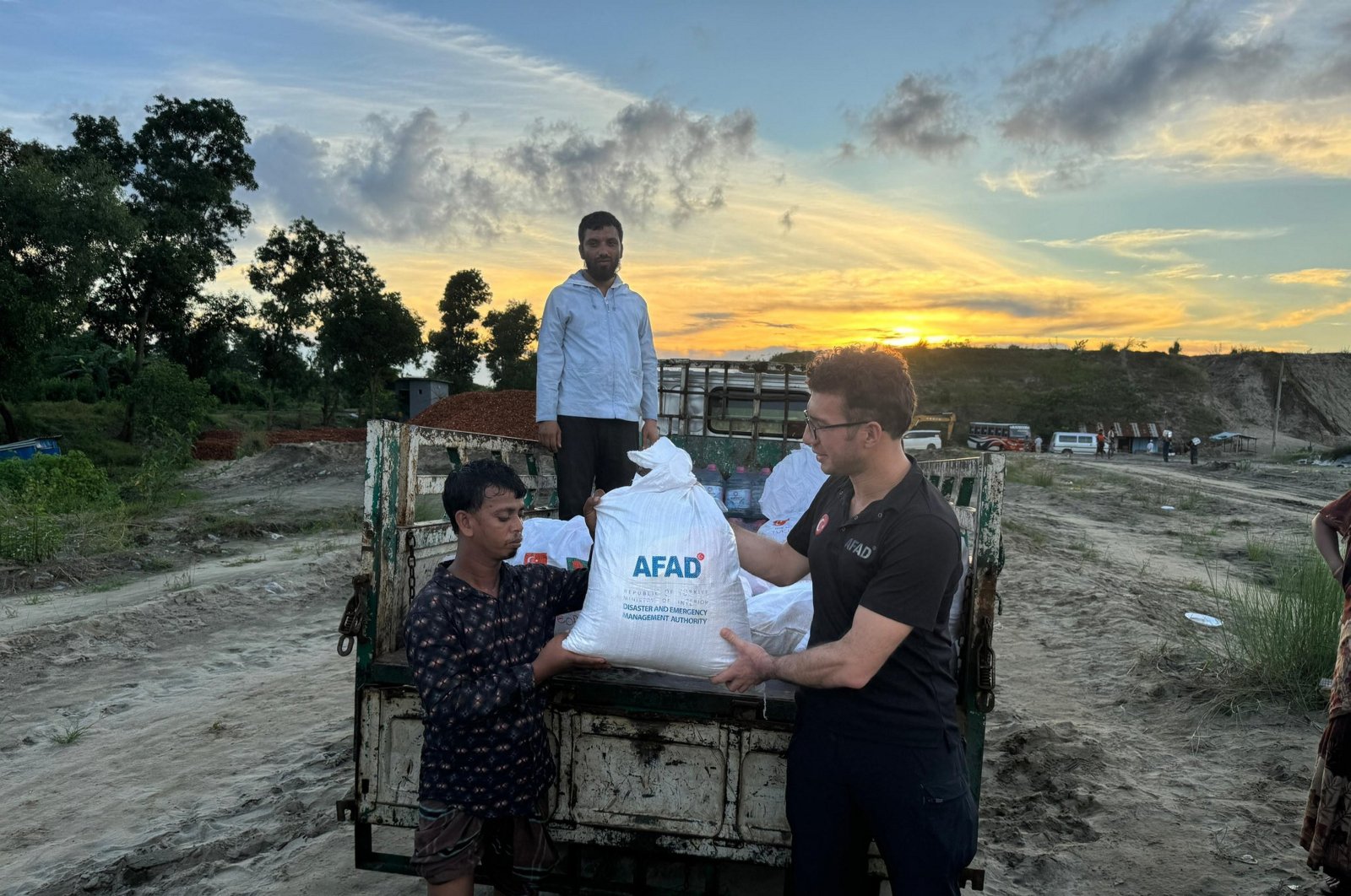 The Disaster and Emergency Management Authority (AFAD) is delivering aid packages to those affected by the flood disaster in Bangladesh, Aug. 27, 2024. (AA Photo) 