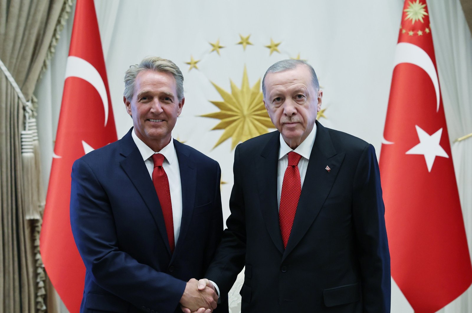 U.S. Ambassador in Ankara Jeff Flake (L) shakes hands with President Recep Tayyip Erdoğan, Ankara, Türkiye, Aug. 28, 2024. (AA Photo)