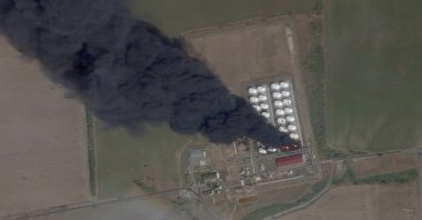 A satellite image shows smoke and fire rising from an oil depot after a reported Ukrainian attack at Astakhov in the Kamensky district, Rostov Region, Russia, Aug. 28, 2024. (Reuters Photo)
