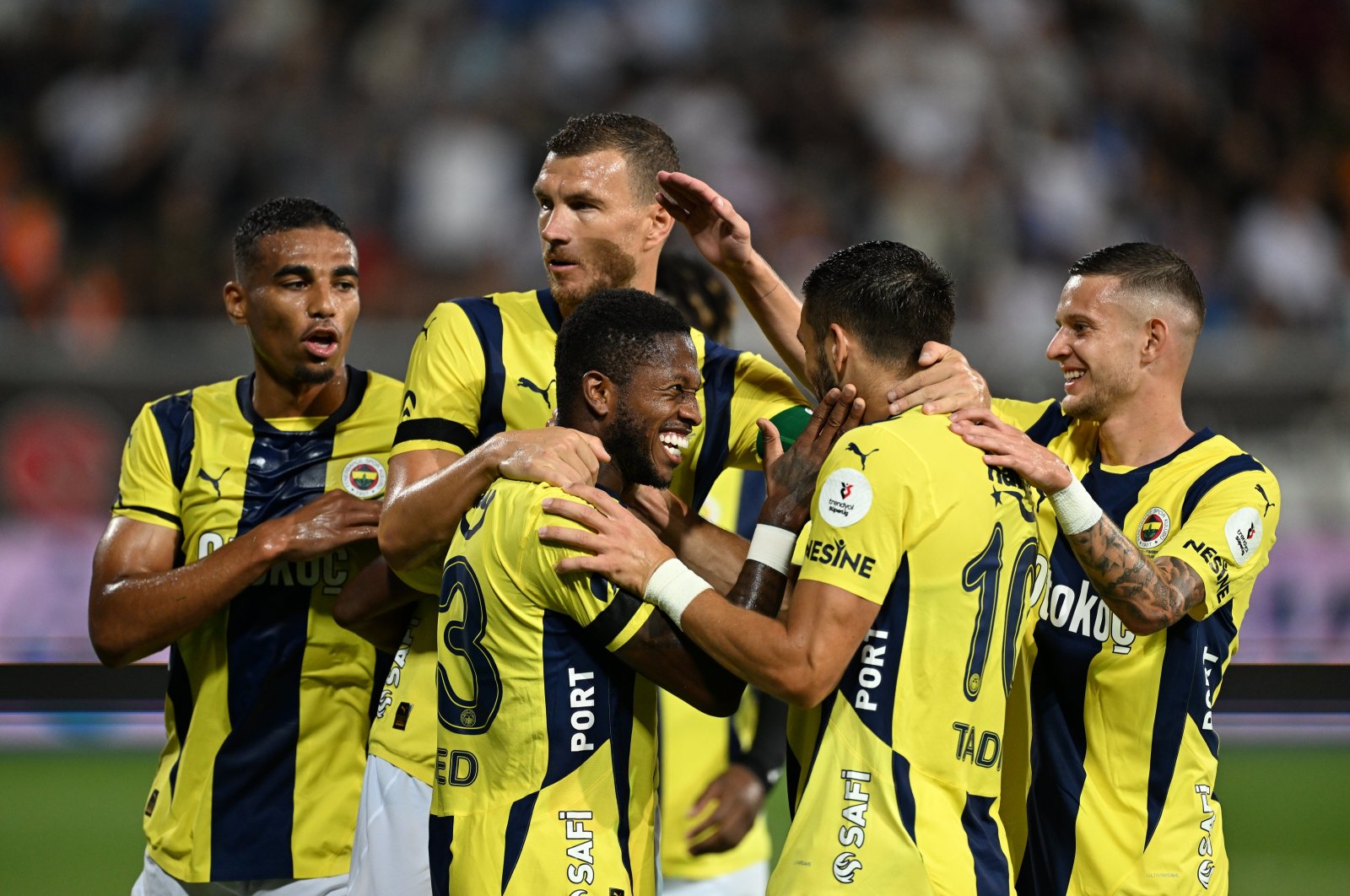 Fenerbahçe players celebrate following a goal against Rizespor at the Didi Stadium, Rizespor, Türkiye, Aug. 25, 2024. (AA Photo)