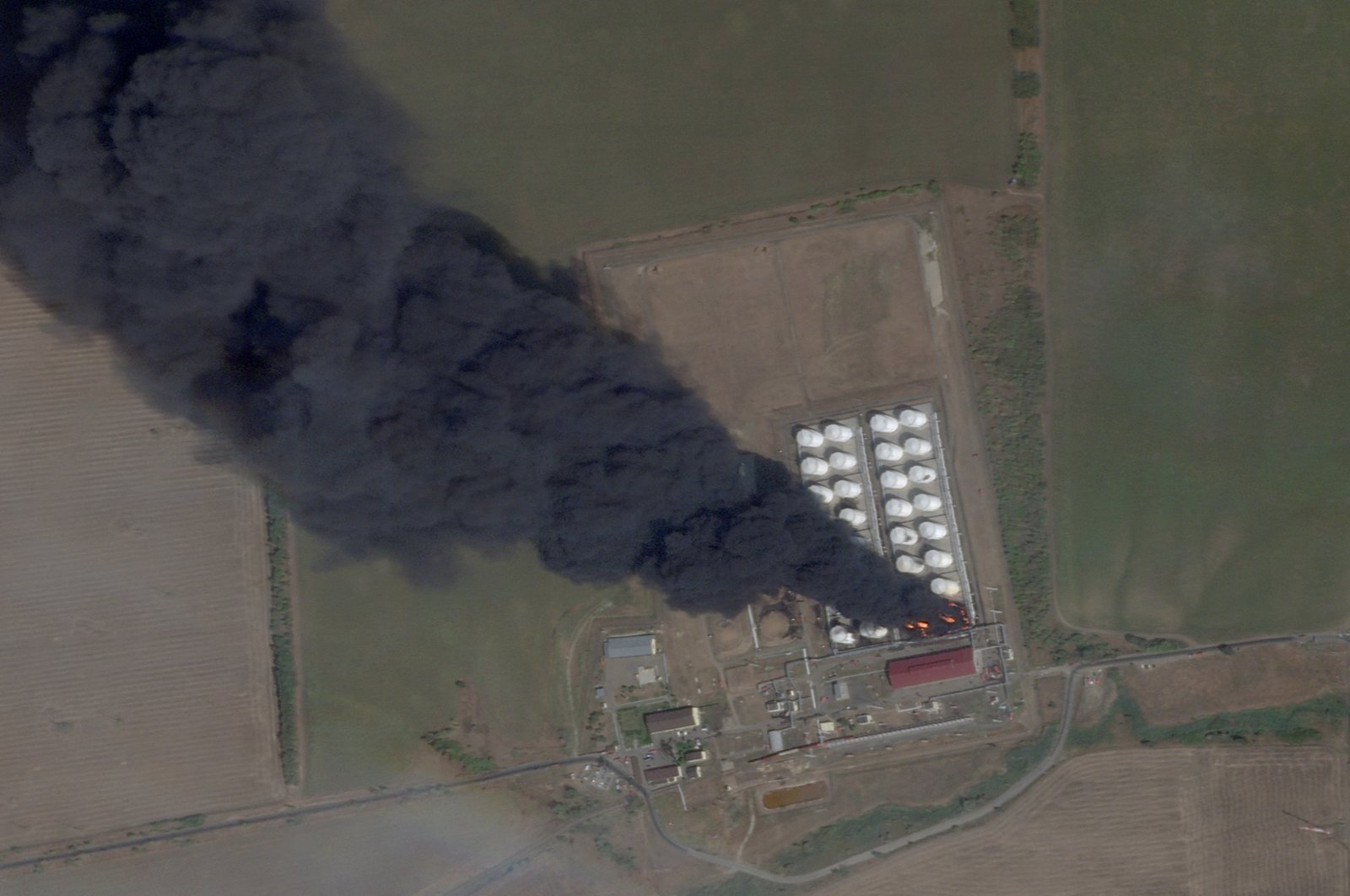 A satellite image shows smoke and fire rising from an oil depot after a reported Ukrainian attack at Astakhov in the Kamensky district, Rostov Region, Russia, Aug. 28, 2024. (Reuters Photo)