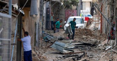 People check the devastation in the Nur Shams refugee camp near Tulkarem in the aftermath of a large-scale Israeli military operation in the occupied West Bank, Palestine, Aug. 30, 2024. (AFP Photo)