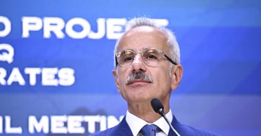 Transport and Infrastructure Minister Abdulkadir Uraloğlu speaks at a meeting in Istanbul, Türkiye, Aug. 29, 2024. (AA Photo)