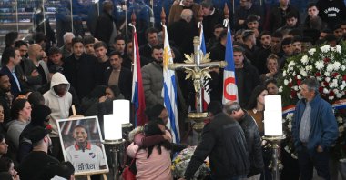 People mourn next to the coffin of late Uruguay&#039;s Nacional football player Juan Manuel Izquierdo, Montevideo, Uruguay, Aug. 29, 2024. (AA Photo)