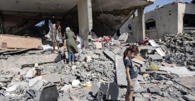 Internally displaced Palestinians inspect their home after a ground military operation by Israeli forces, in Khan Younis camp, southern Gaza Strip, Aug. 30, 2024. (EPA Photo)