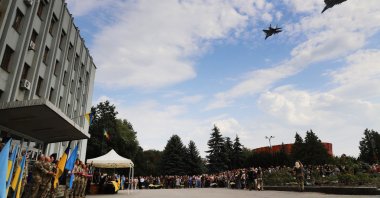 In this handout photograph taken and released by the Air Command 'West' of the Air Forces of Ukraine on Aug. 29, 2024, two MiG-29 fighter jets fly to pay tribute to Oleksiy Mes, a pilot of the Air Force of the Armed Forces of Ukraine, who had died in a crash while repelling a Russian air attack, during his farewell ceremony in Shepetivka, Khmelnytskyi region. (AFP Photo, Handout)