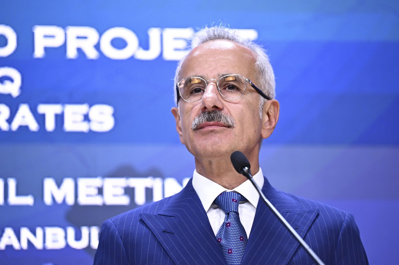 Transport and Infrastructure Minister Abdulkadir Uraloğlu speaks at a meeting in Istanbul, Türkiye, Aug. 29, 2024. (AA Photo)