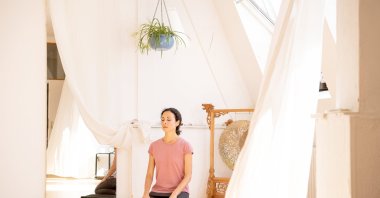 According to a 2023 survey by Germany's Professional Association of Yoga Teachers (BDY), 74% of yogis do their sessions at home, while only around a fifth attend a special studio or go to a gym. (dpa Photo)