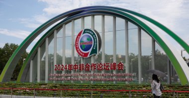 A person passes by signage for the Summit of the Forum on China-Africa Cooperation (FOCAC), Beijing, China, Sept. 1, 2024. (EPA Photo)