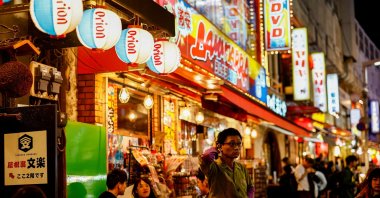 People enjoy drinks and food at izakaya pub restaurants at the Ameyoko shopping district, Tokyo, Japan, Feb. 15, 2024. (Reuters Photo)